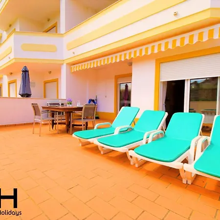 Sunny Terrace Facing The Pool And Barbecue By Algarve Dream Holidays